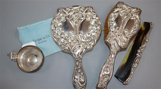 An American Art Nouveau sterling three piece dressing table set and a Tiffany & Co sterling taste vin.